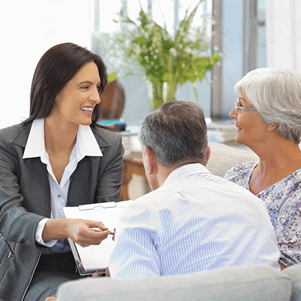 woman talking to couple