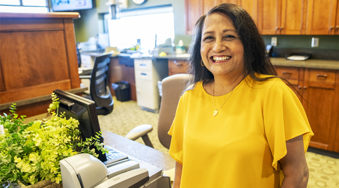 teller smiling in teller line