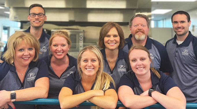 PREMIER employees volunteering at soup kitchen